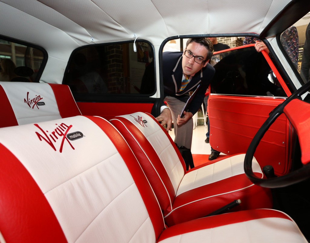 Jack Brockbank from Guinness World Records inspects the Mini to ensure it meets the requirements