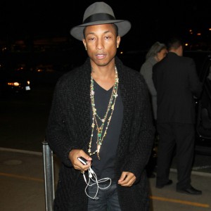 Pharrell Williams arrives in style at LAX