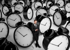 businessman and many clock